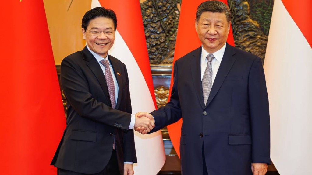 習近平24日與黃循財會面。X@LawrenceWongST