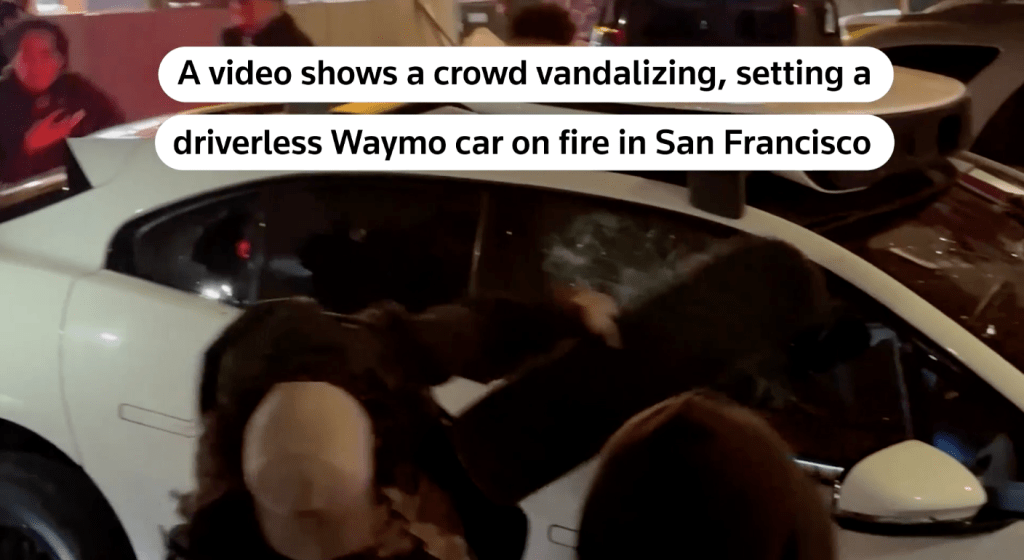 路透社影片顯示，有人用滑板砸車窗。