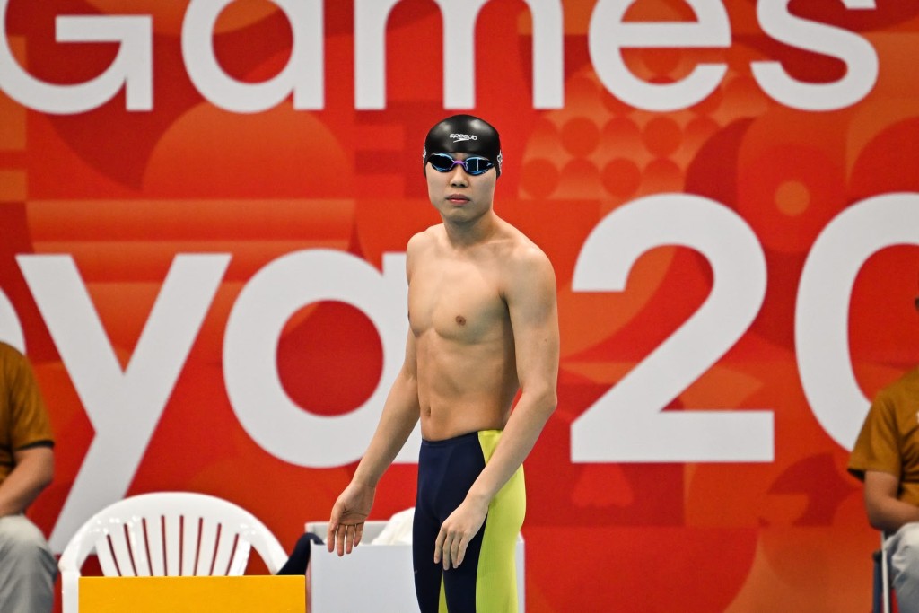 张智杰及麦世霆成功在男子100米蛙泳晋级决赛。刘骏轩摄