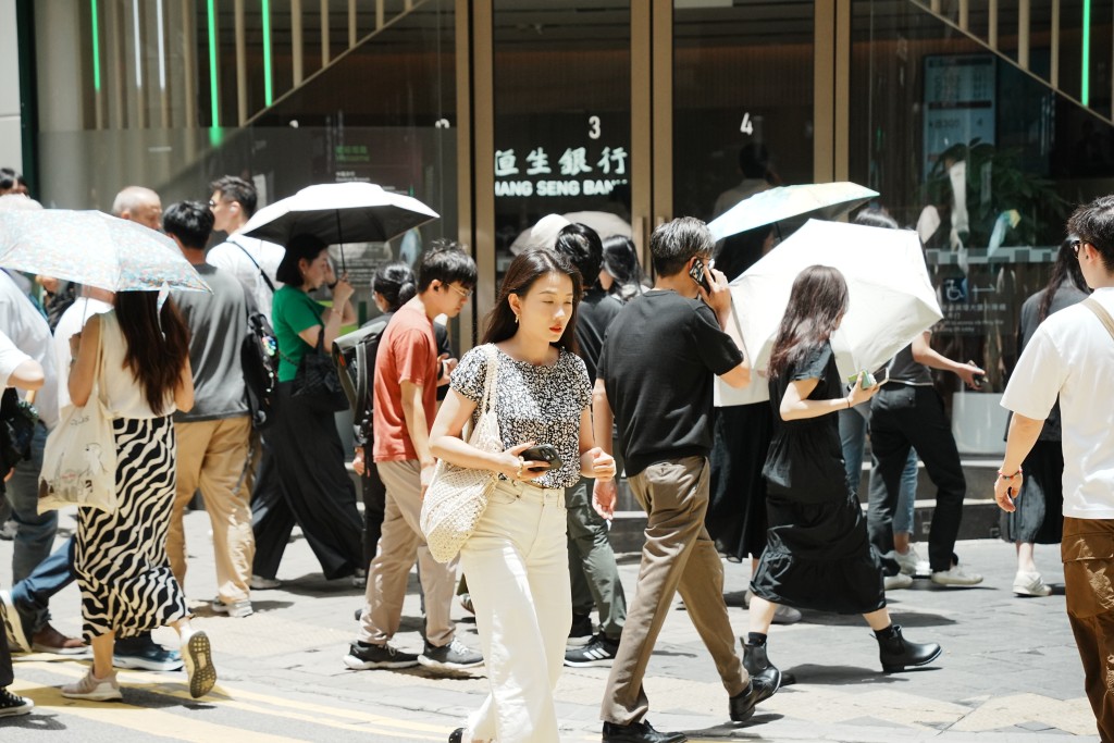 打工仔只要額外請數日假,便可自製長假期。汪旭峰攝 打工仔只要額外請數日假,便可自製長假期。汪旭峰攝