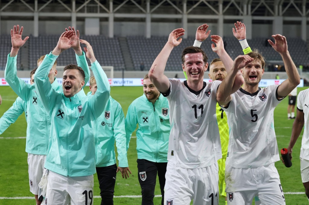 奥地利暂列H组榜首。路透社