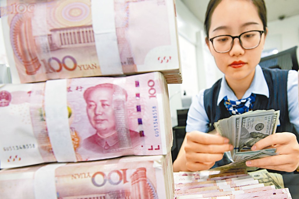 人行昨下調LPR利率後，離岸人民幣隨即下跌。