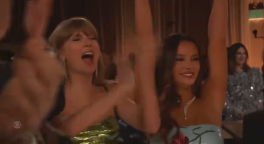 Taylor为好友爱玛封后鼓掌。