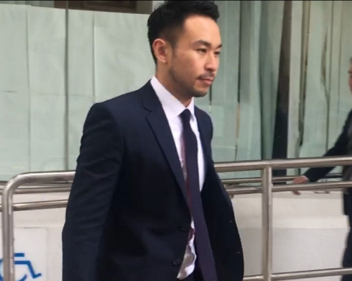 32歲年輕律師梁榮毅。梁銘姿攝