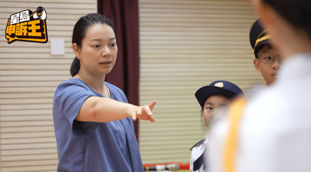 邱老师指队员不仅要自律，还要成为其他同学的榜样。