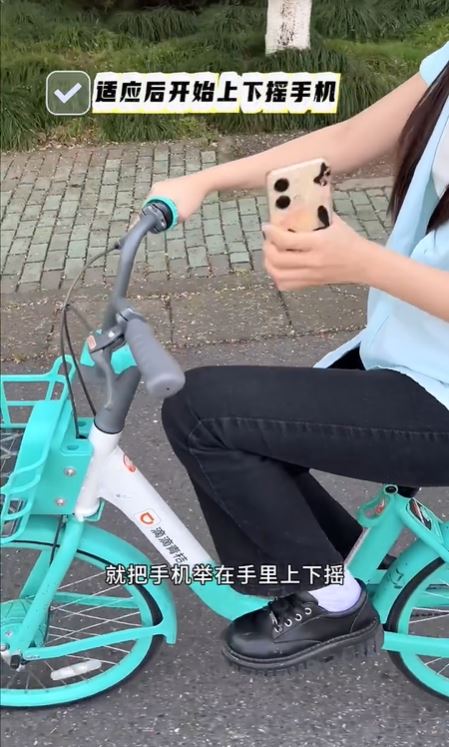 網上有人教如何安全踏單車搖手機，以虛報「校園跑」紀錄。