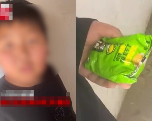 三男童躲廁所吃零食被老師揭發。影片截圖