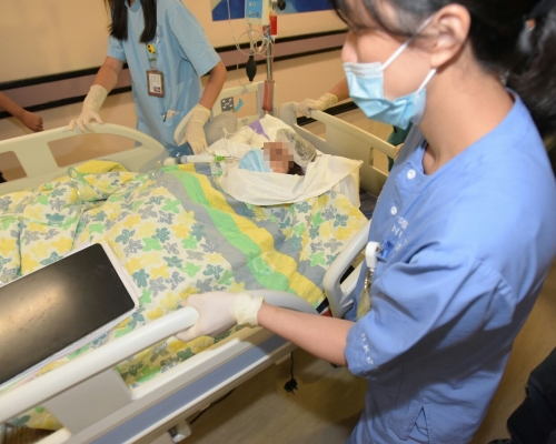 男事主目前仍然昏迷。黃文威攝