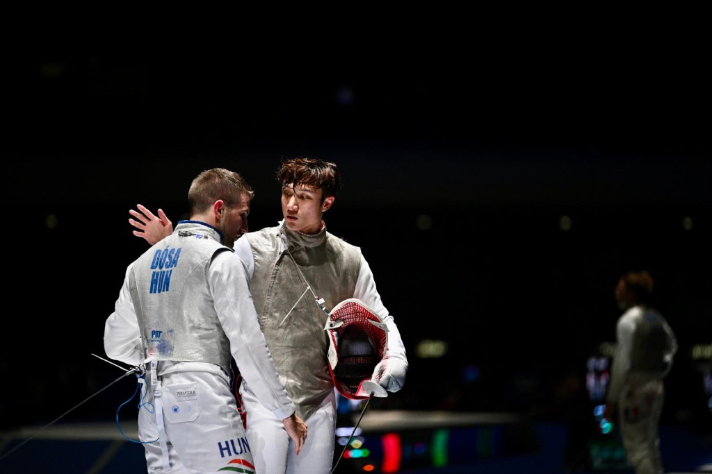 Ryan 在16强不敌Daniel Dosa(左),世界排名首次跌出头5位。苏正谦摄 Ryan 在16强不敌Daniel Dosa(左),世界排名首次跌出头5位。苏正谦摄