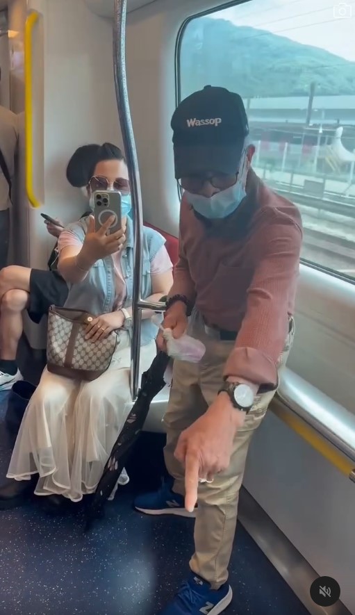 何生指手劃腳保護老婆。 何生指手劃腳保護老婆。