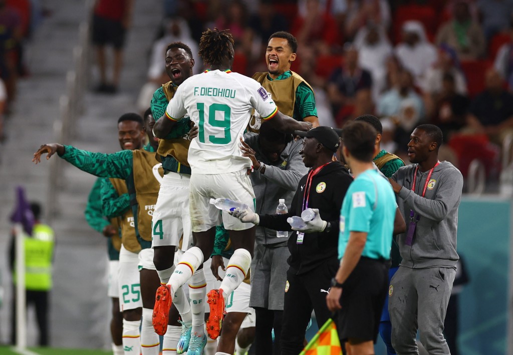 塞內加爾前鋒法馬拉迪希奧頂成2:0後興奮慶祝。REUTERS