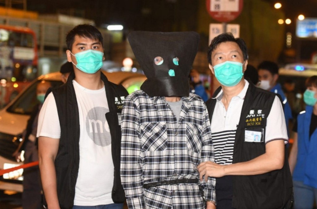 其中一名被告被捕時的情形。資料圖片