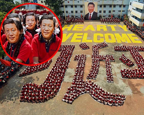 中印領導人第二次非正式峰會將在印度金奈舉行，一所學校安排2000名學生帶着面具排出習近平的漢字字樣。（網圖）