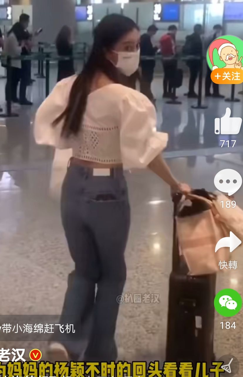 Angelababy停低回頭望個仔,不經已露出水蛇腰。