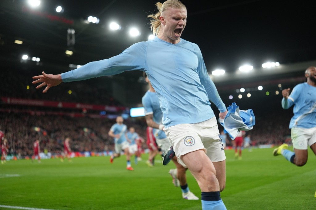 夏蘭特的12碼助曼城反勝利物浦。（美聯社）