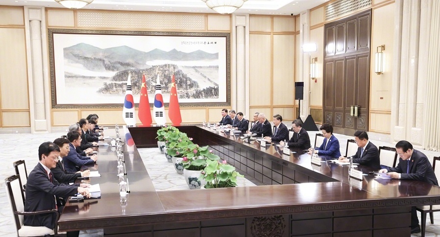 习近平与南韩总理会晤，称认真考虑访韩。新华社