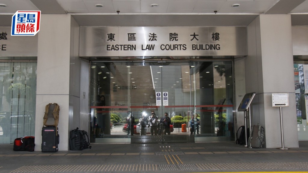 網紅「唐狗」承認擅闖地盤攀爬天秤及違規航拍等4項罪名,還押至8月8日判刑。資料圖片