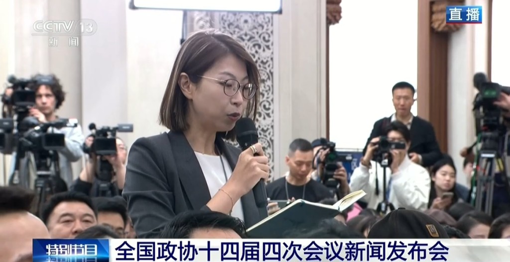 人民日報記者提問。 人民日報記者提問。