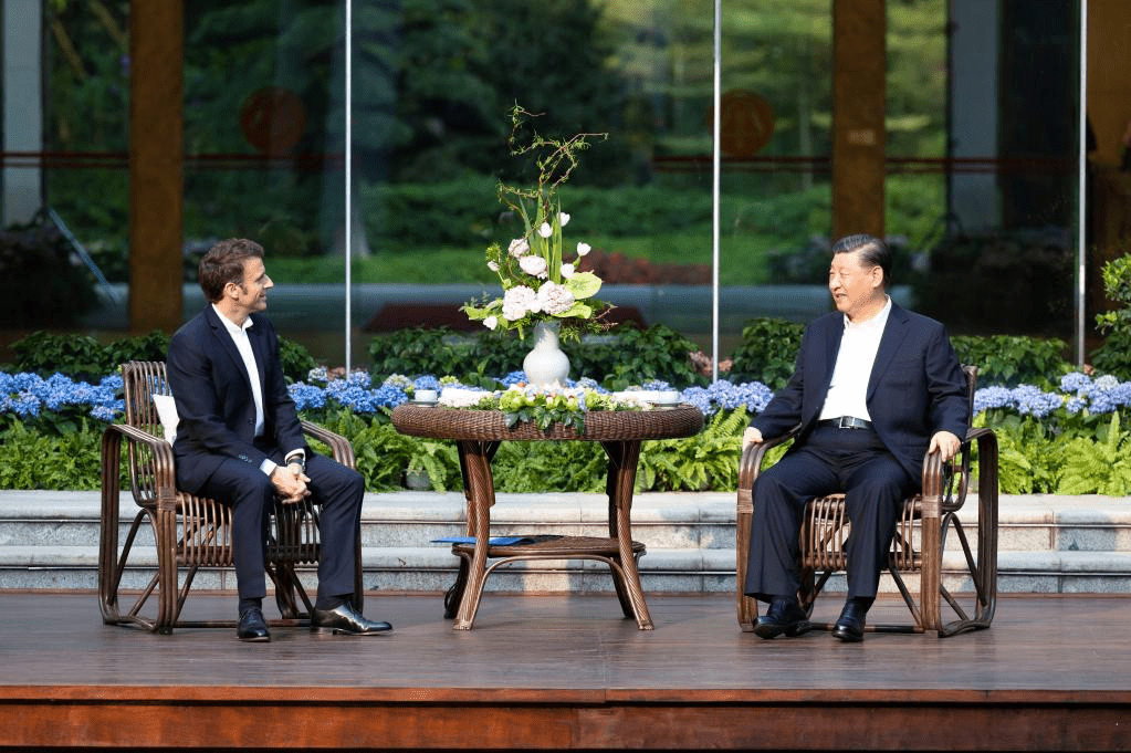 习近平去年在广州与法国总统马克龙举行非正式会晤。新华社