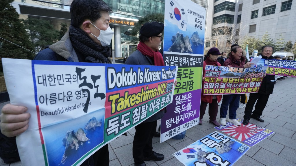 南韩人抗议日本宣称拥有独岛（日本称竹岛）主权。 美联社