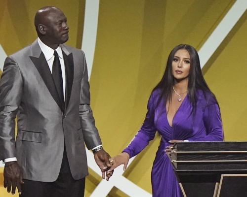 米高佐敦(左)与云妮莎(右)。AP