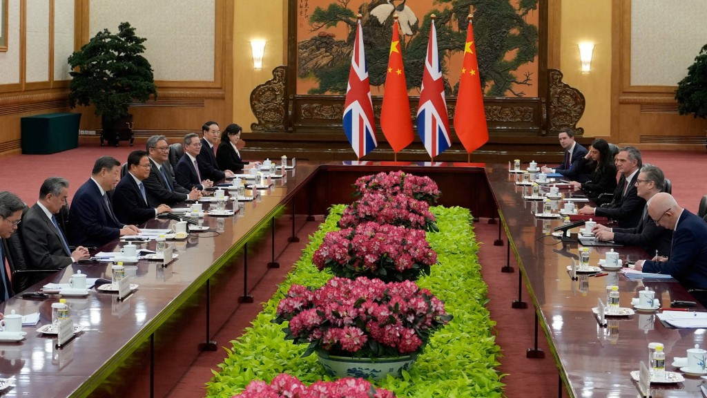 國家主席習近平今在北京人民大會堂會見來華訪問的英國首相施紀賢。 路透社