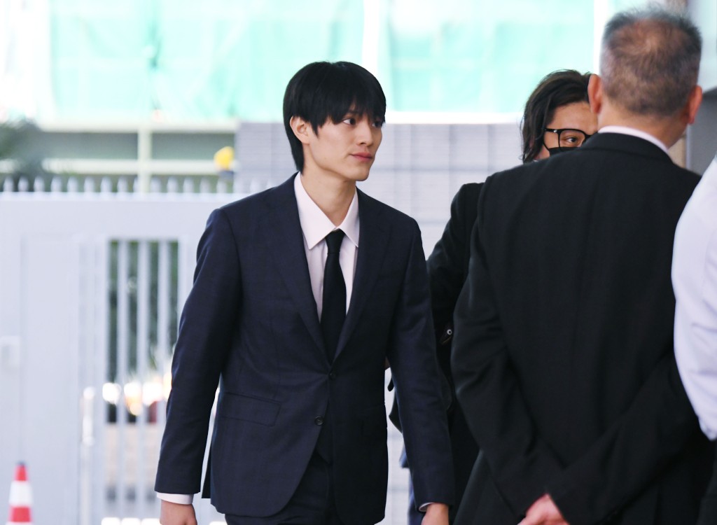 上村謙信步入西九龍裁判法院。何健勇攝 上村謙信步入西九龍裁判法院。何健勇攝