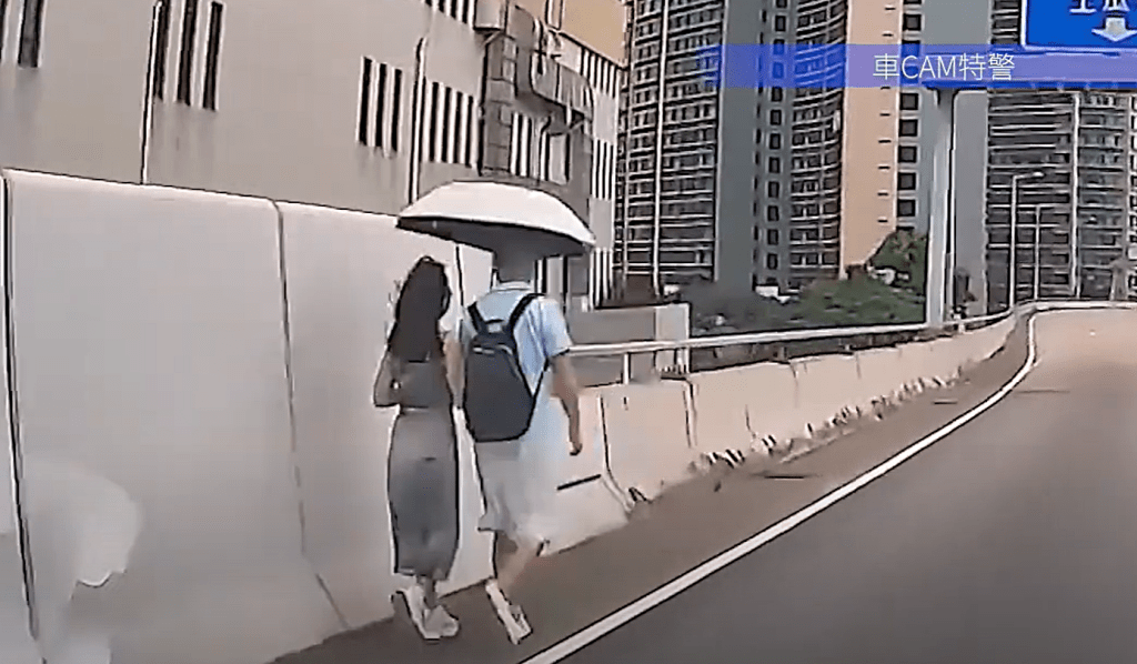 四男女沿着红磡公主道连接路行走。YouTube：车CAM特警