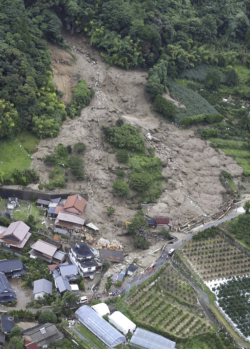 日本九州暴雨迄今造成至少1人死亡，10人失踪。（美联社）