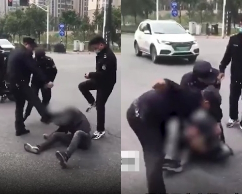 3名城管涉嫌在街上毆打商販被解聘。影片截圖