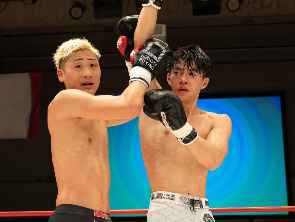 向籽羲（右）表現獲日本觀眾及對手團隊讚賞，有望再戰。中國香港綜合搏擊運動總會圖片