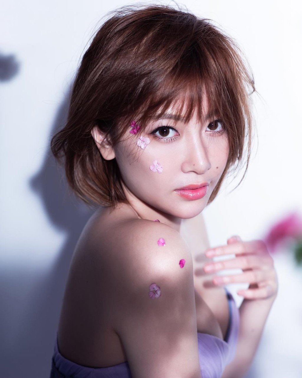 Rose Ma面上都有粒痣跟床照女子生喺同一位置。