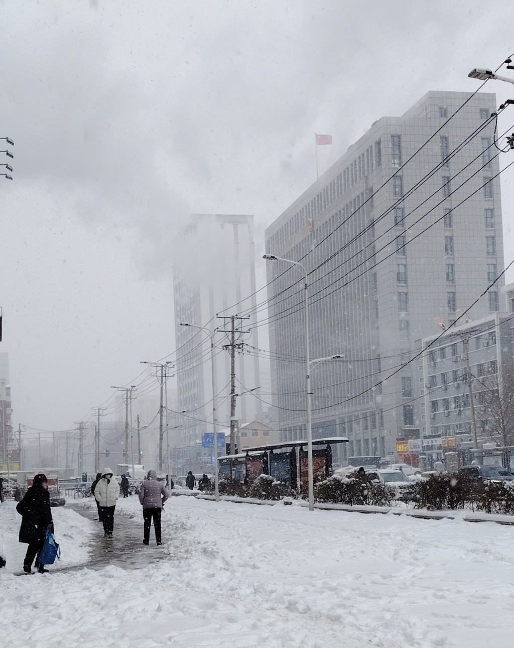 網民分享遼寧各地街頭的雪景。微博 網民分享遼寧各地街頭的雪景。微博