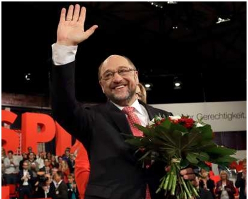 舒尔茨有机会在大选中击败争取再度连任的默克尔。AP图片