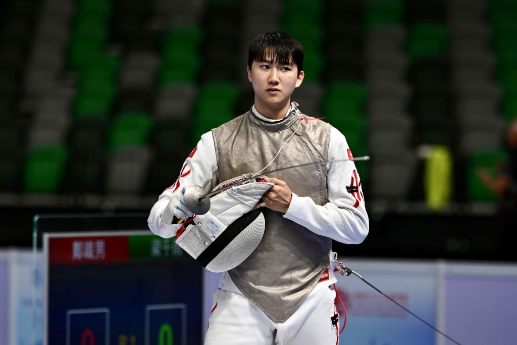 梁千雨(图)今仗再次伙拍队友出战团体赛。星岛图片