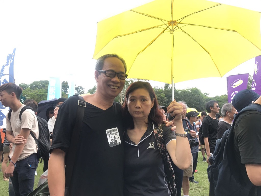 63歲的梁先生及太太每年都會參加民主訴求的活動。