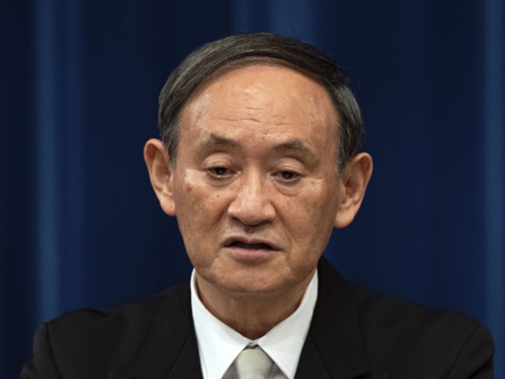 日本首相菅義偉指,疫情再次擴大,日後可能導致醫療系統告急。AP資料圖片