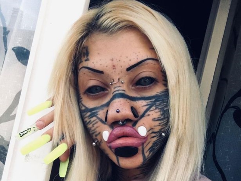 現在的 Aydin 的臉頰和嘴唇上共有20多個穿孔和12個划痕。網圖