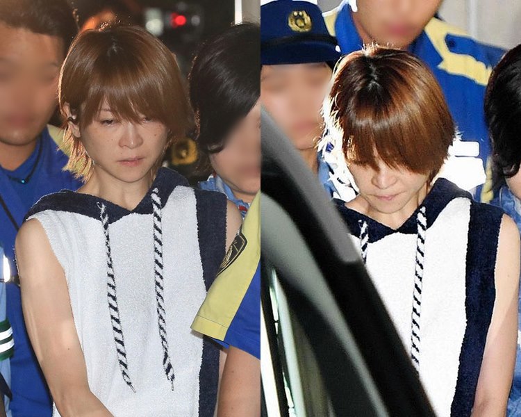 吉澤瞳本月初涉醉駕傷人後，被警方押送至檢察院。（網圖）