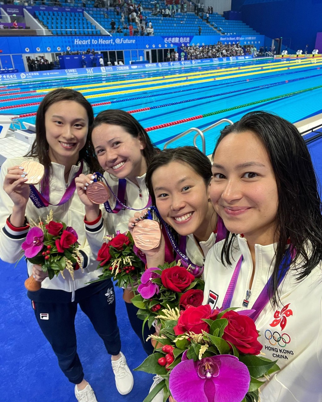 歐鎧淳與隊友在女子4X100米混合泳接力項目，奪得銅牌。