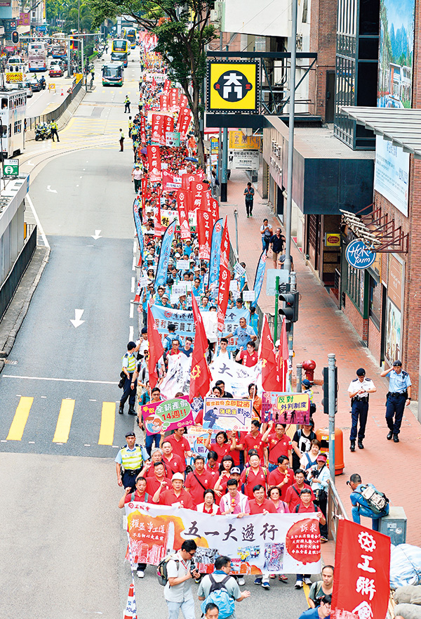 5月1日劳动节游行，主题一般都是争取劳工权益。资料图片