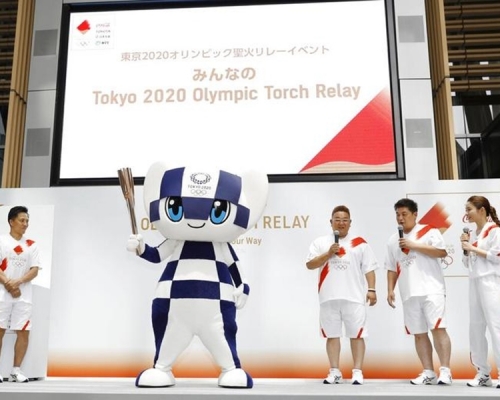 明年東京奧運火炬傳遞周一開始招募火炬手。　AP圖片