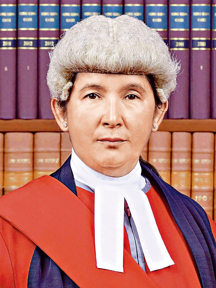 法官李素蘭指被告熟悉戶口內巨額資金往來,不接納他不牽涉洗黑錢的辯解。