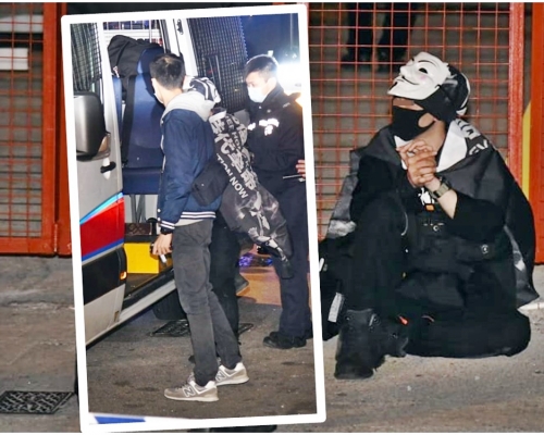 「理大廚房佬」戴起「V煞」面具披上印有「光時」字句的披肩被拘捕。