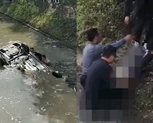 上海駕駛學校一輛訓練車墜河,一男子被困搶救後不治。(網上影片截圖)