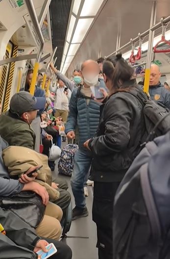 阿伯怒目相向馬尾女。fb馬路的事討論區IntelligentRaspberry8256影片截圖