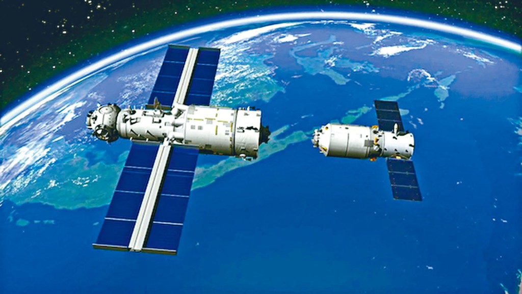 天舟二號(右)和天和太空站核心艙對接示意圖。