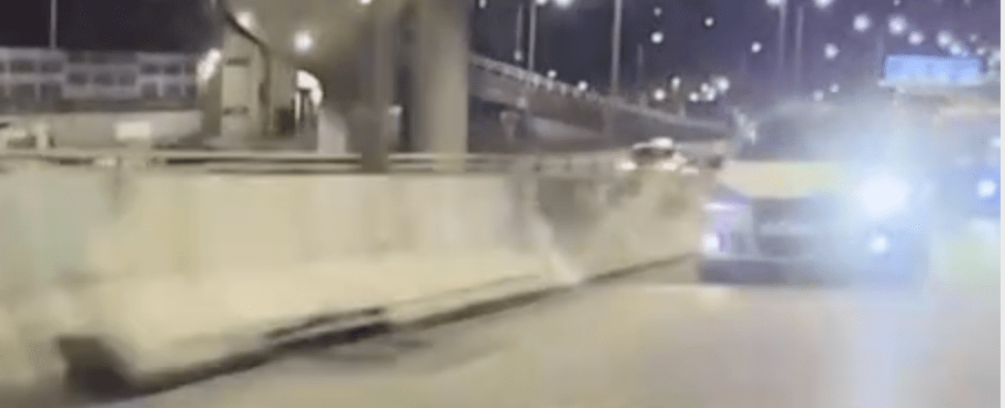 短片一開始,一部私家車在觀塘道高速飛馳。 短片一開始,一部私家車在觀塘道高速飛馳。