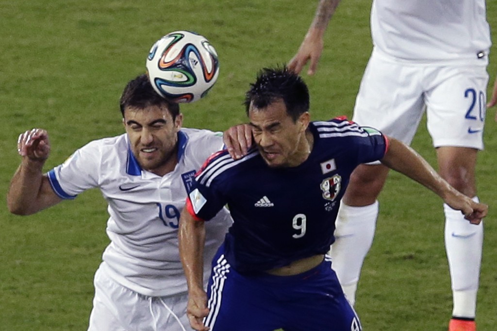 一四年巴西世界盃，日本在分組賽遇上希臘，雖然前者於三十八分鐘開始打多一個，但都未能攻破對方大門，賽和0:0。AP資料圖片
