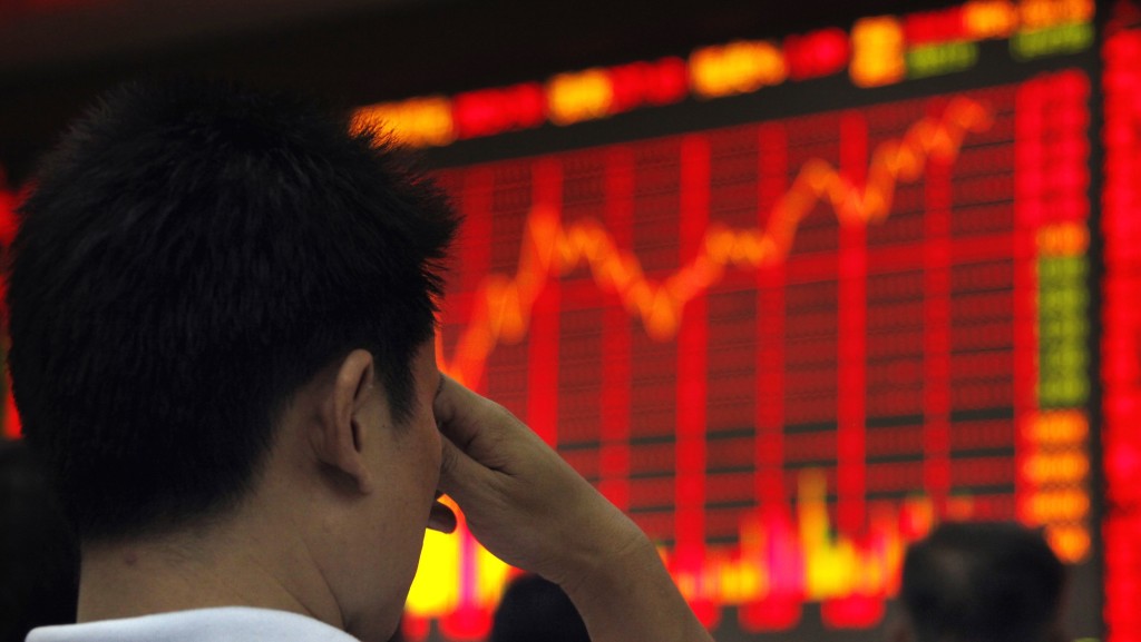 北京金融區一家經紀行的股票訊息屏幕。 路透社